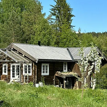 Old Farmstead With Log By River At Lonin Ferienhaus *