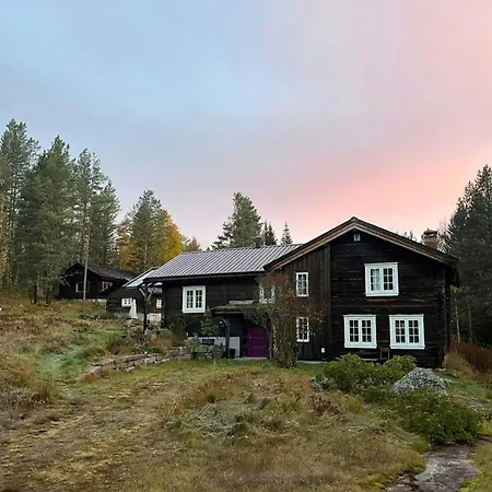 Old Farmstead With Log By River At Lonin Ferienhaus